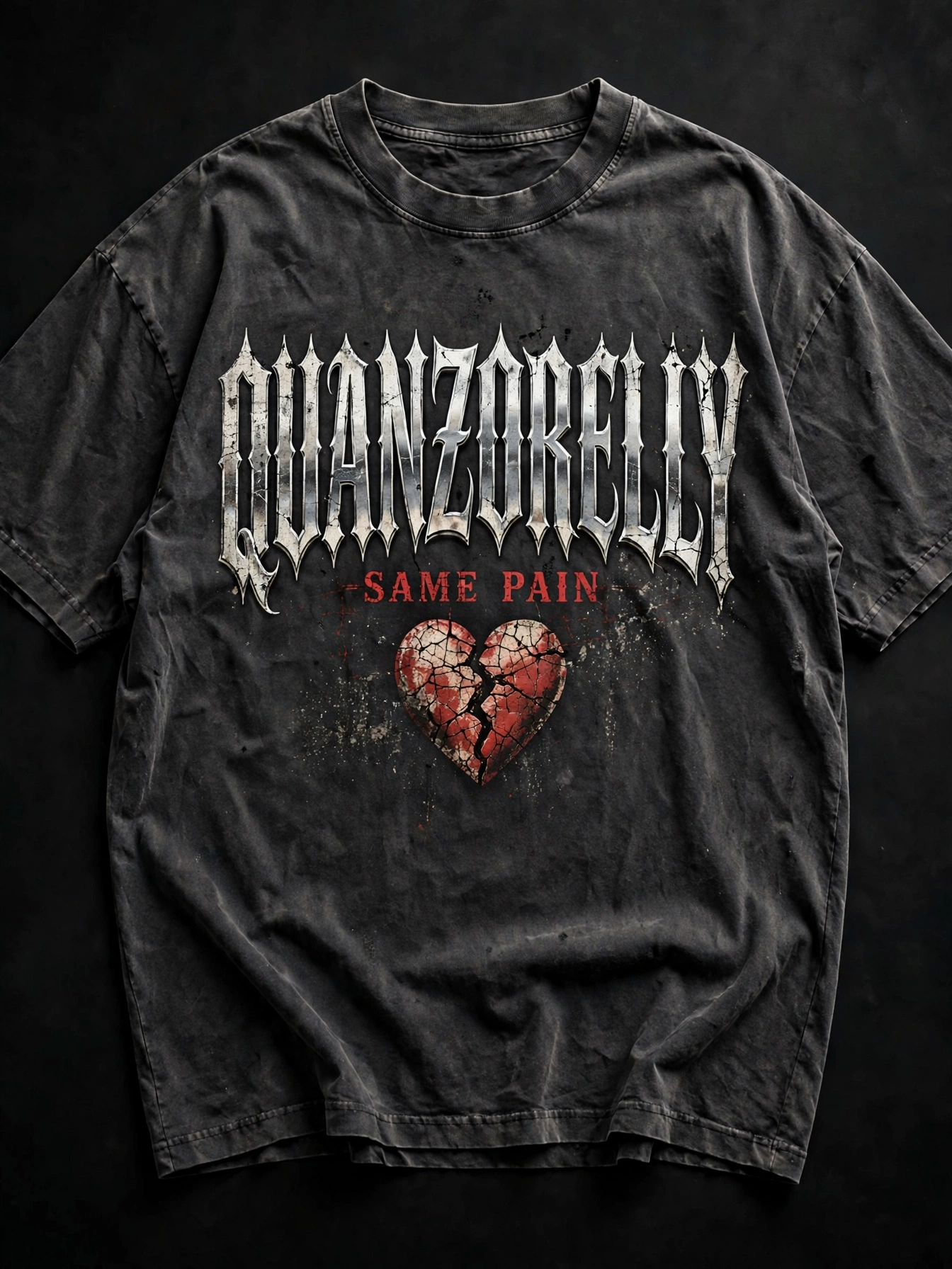 Tour tee — vintage-wash tee with QuanZoRelly in gothic chrome lettering over a cracked heart